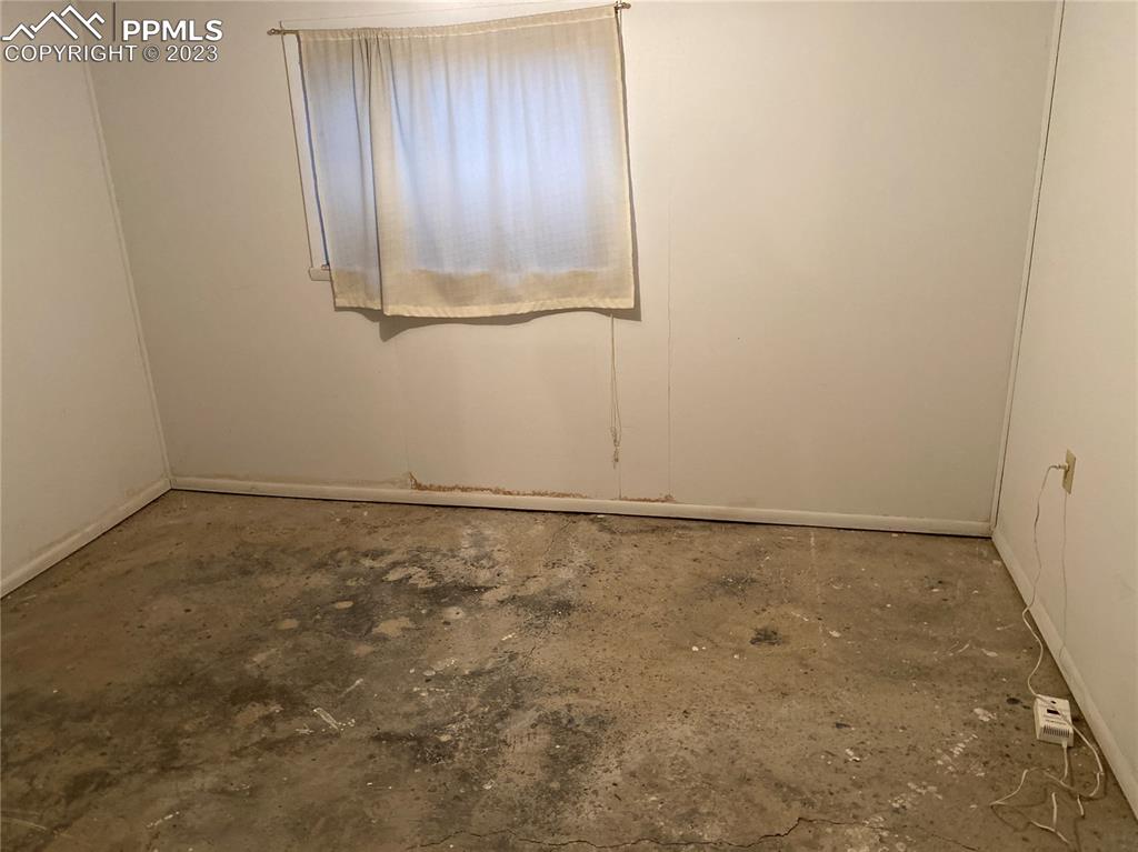 2150 Glenn Street Colorado Springs, CO 80904 - Photo 9 of 30 an empty room with a window