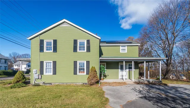 a view of a yard with trees