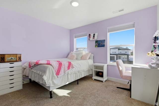 3902 West 825 North West Point, UT 84015 - Photo 13 of 49 Bedroom featuring light carpet and baseboards