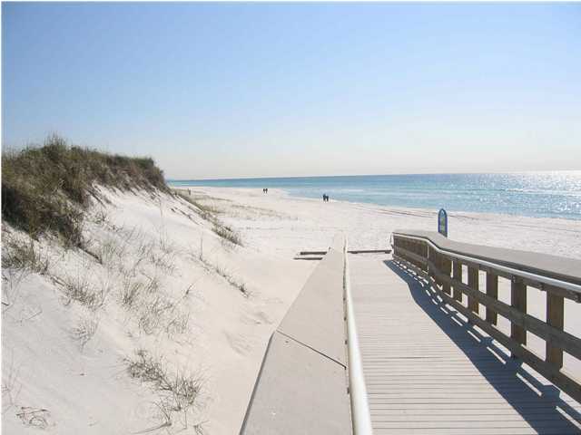 262 North Orange St Inlet Beach Inlet Beach, FL 32461 - Photo 3 of 6 a terrace with a wooden floor