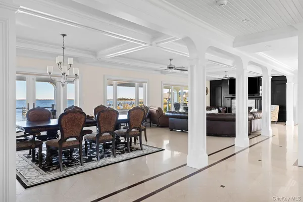 a kitchen with granite countertop a sink stainless steel appliances and cabinets