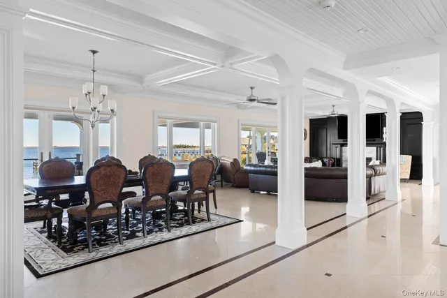 a kitchen with granite countertop a sink stainless steel appliances and cabinets
