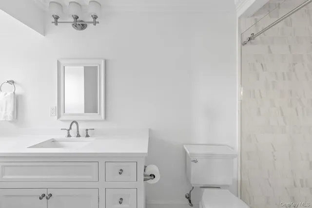 a utility room with sink dryer and washer