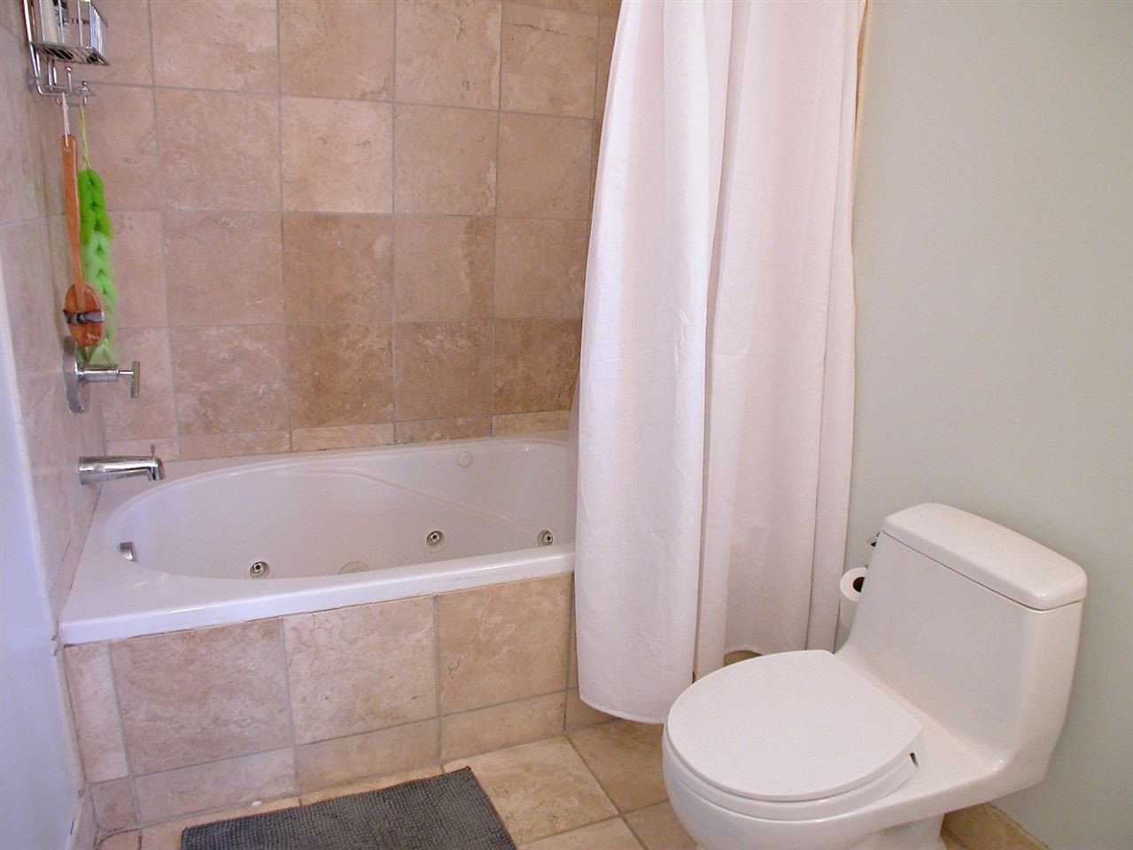 4709 Wedgewood Street Raleigh, NC 27612 - Photo 15 of 25 Fully renovated Master bath including new floor and wall tiles, Jacuzzi tub, toilet, vanity and lighting. Come home and relax. Master Bath/Spa