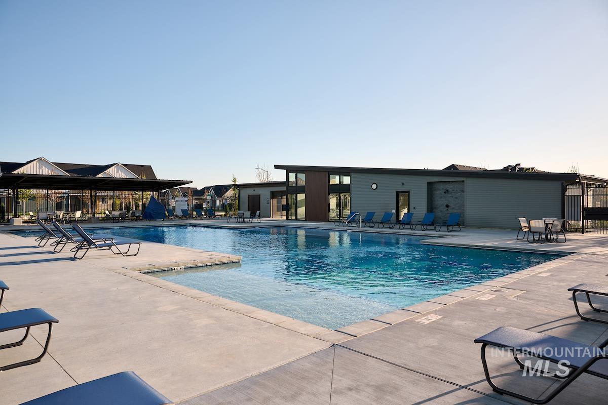 1735 East Acme Street Meridian, ID 83642 - Photo 4 of 8 Expansive outdoor swimming pool with a concrete surround