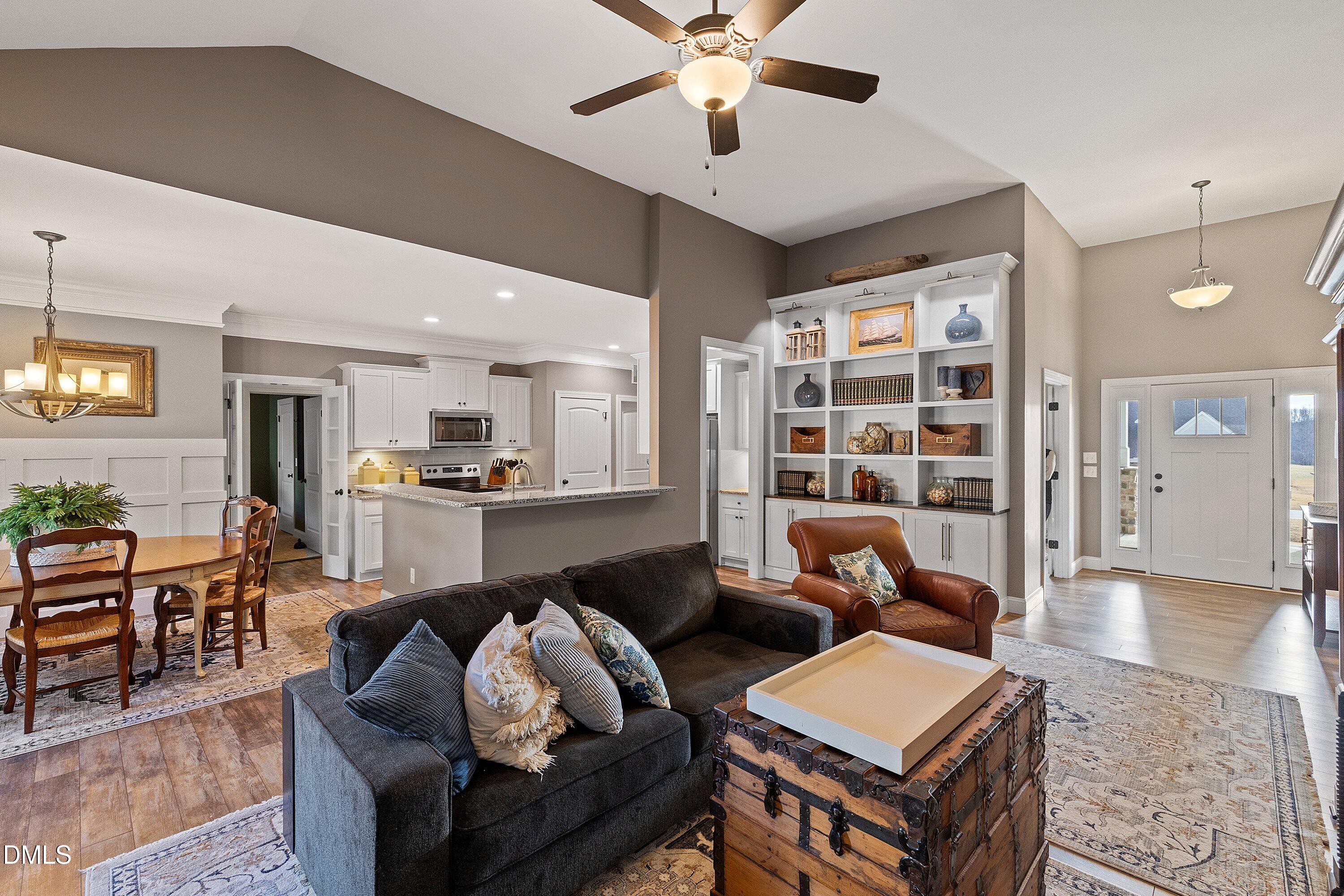 59 Coats Ridge Drive Benson, NC 27504 - Photo 12 of 44 a living room with furniture and wooden floor