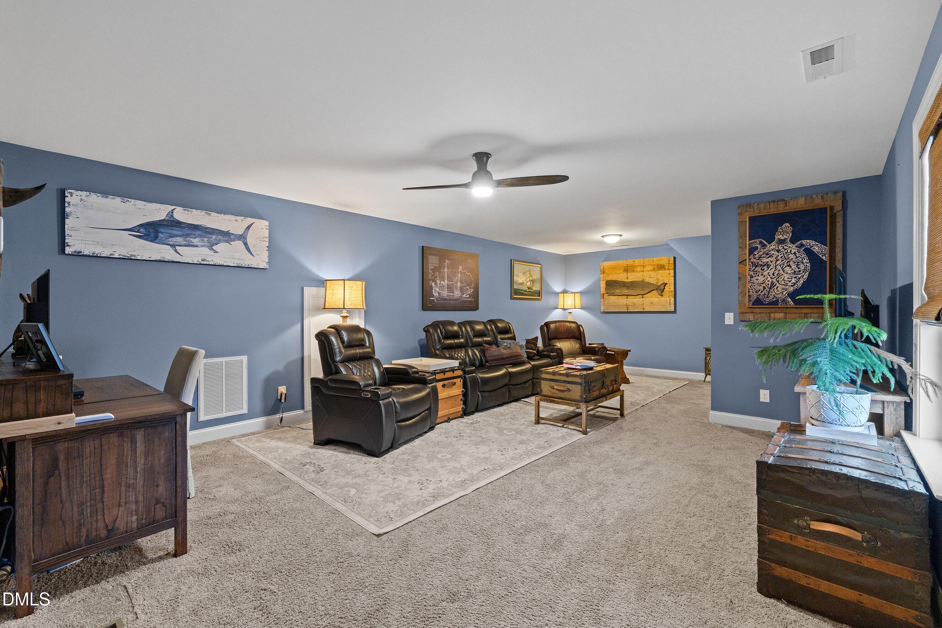59 Coats Ridge Drive Benson, NC 27504 - Photo 28 of 44 a living room with furniture and a piano