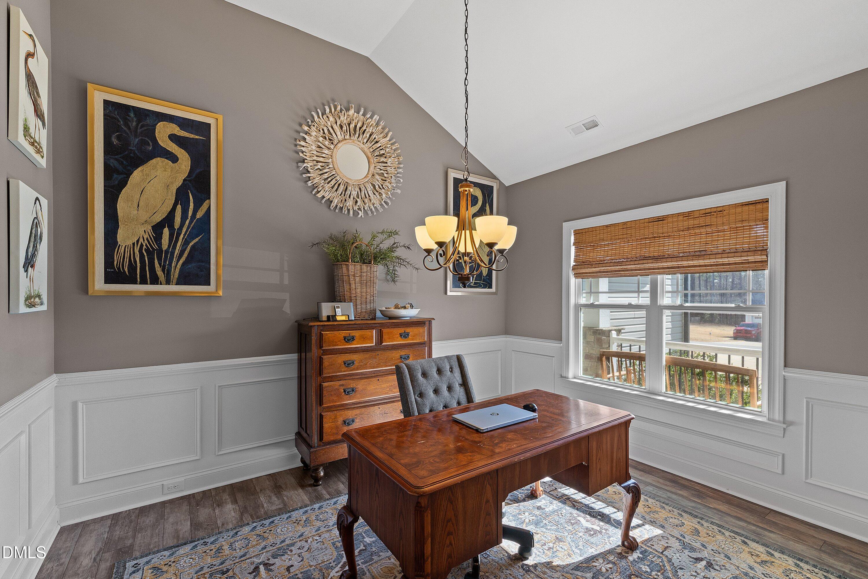59 Coats Ridge Drive Benson, NC 27504 - Photo 4 of 44 a view of a workspace with furniture and a window