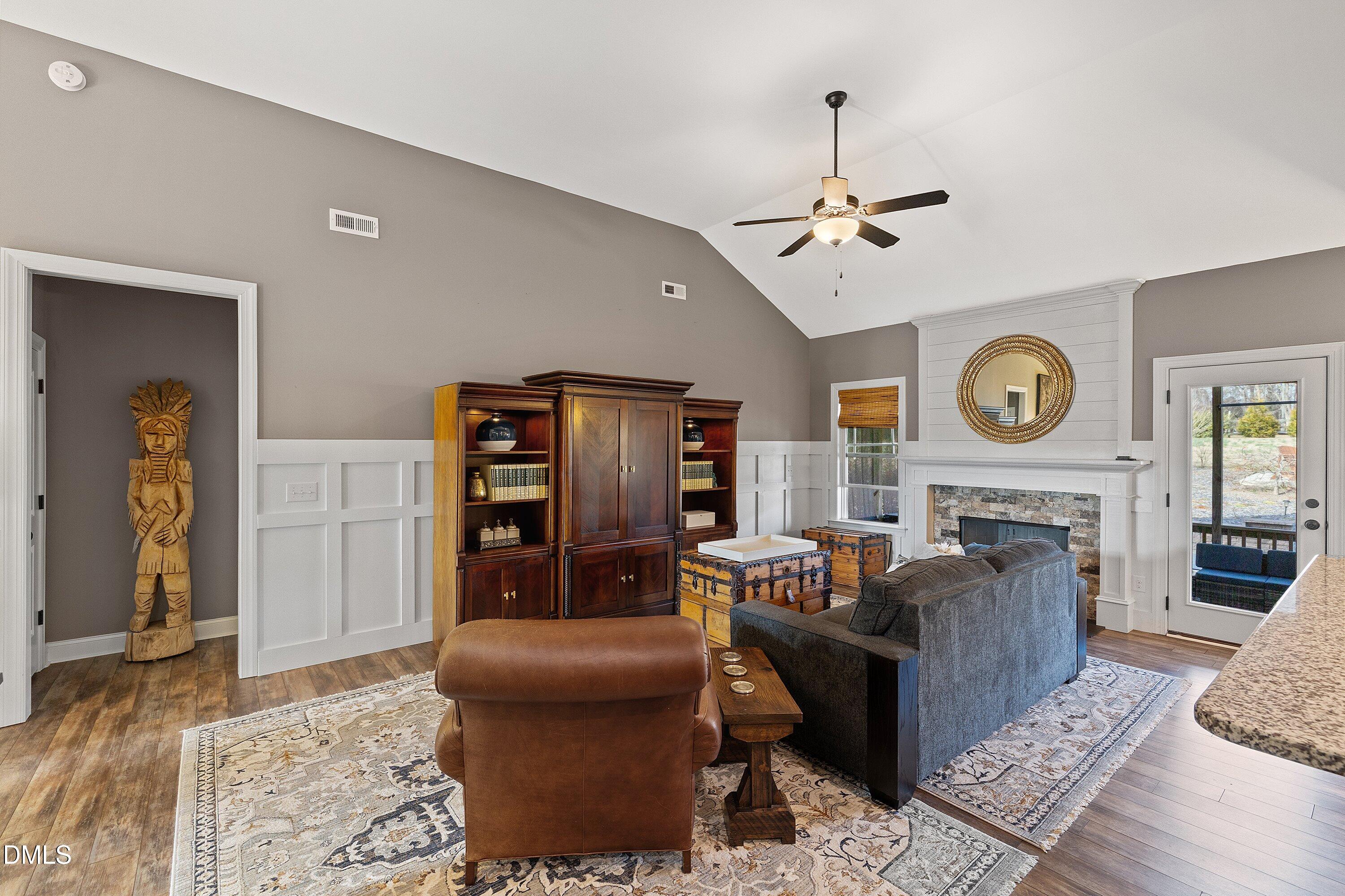59 Coats Ridge Drive Benson, NC 27504 - Photo 6 of 44 a living room with fireplace furniture and a window