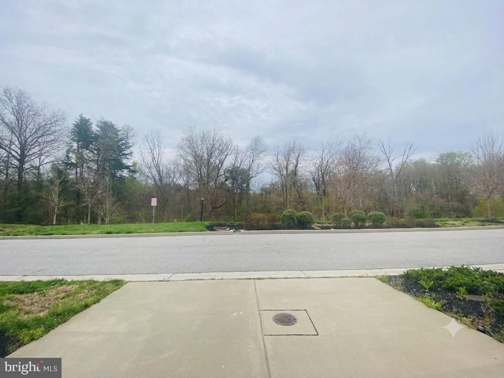 7014 Foxton Way Hanover, MD 21076 - Photo 20 of 29 Serene suburban landscape awaits.