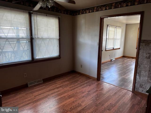 303 16th Street Saxton, PA 16678 - Photo 20 of 44 a view of an empty room with wooden floor and a window