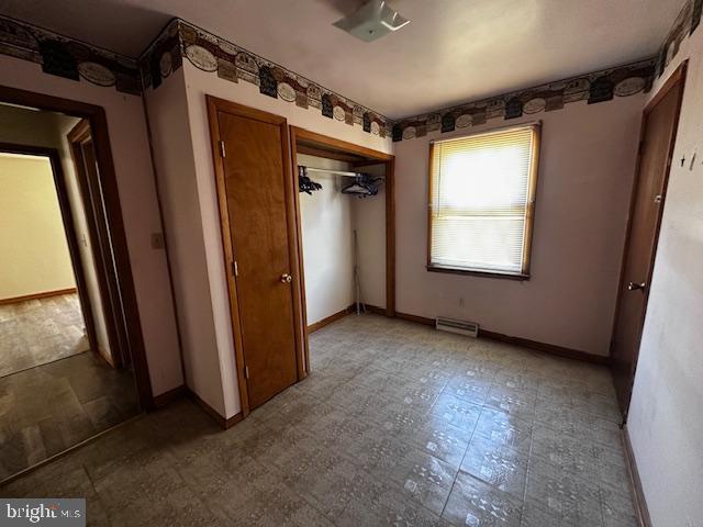 303 16th Street Saxton, PA 16678 - Photo 26 of 44 an empty room with windows and closet