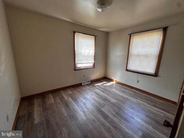 303 16th Street Saxton, PA 16678 - Photo 27 of 44 a view of an empty room with wooden floor and a window