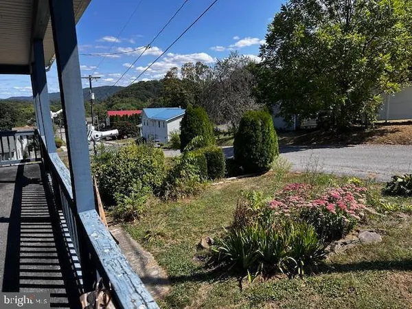 a view of street from balcony