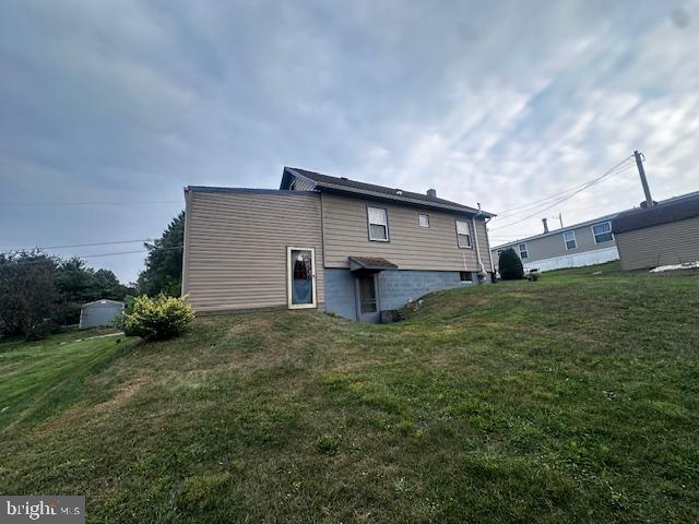 303 16th Street Saxton, PA 16678 - Photo 9 of 44 a house view with a garden space