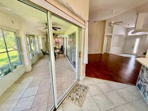 a lobby with furniture and a rug