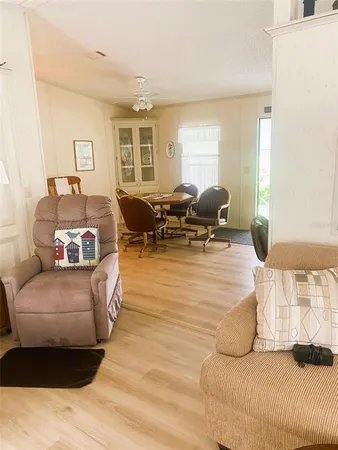 a living room with furniture window and a lamp