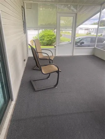 a view of a furniture and floor to ceiling window