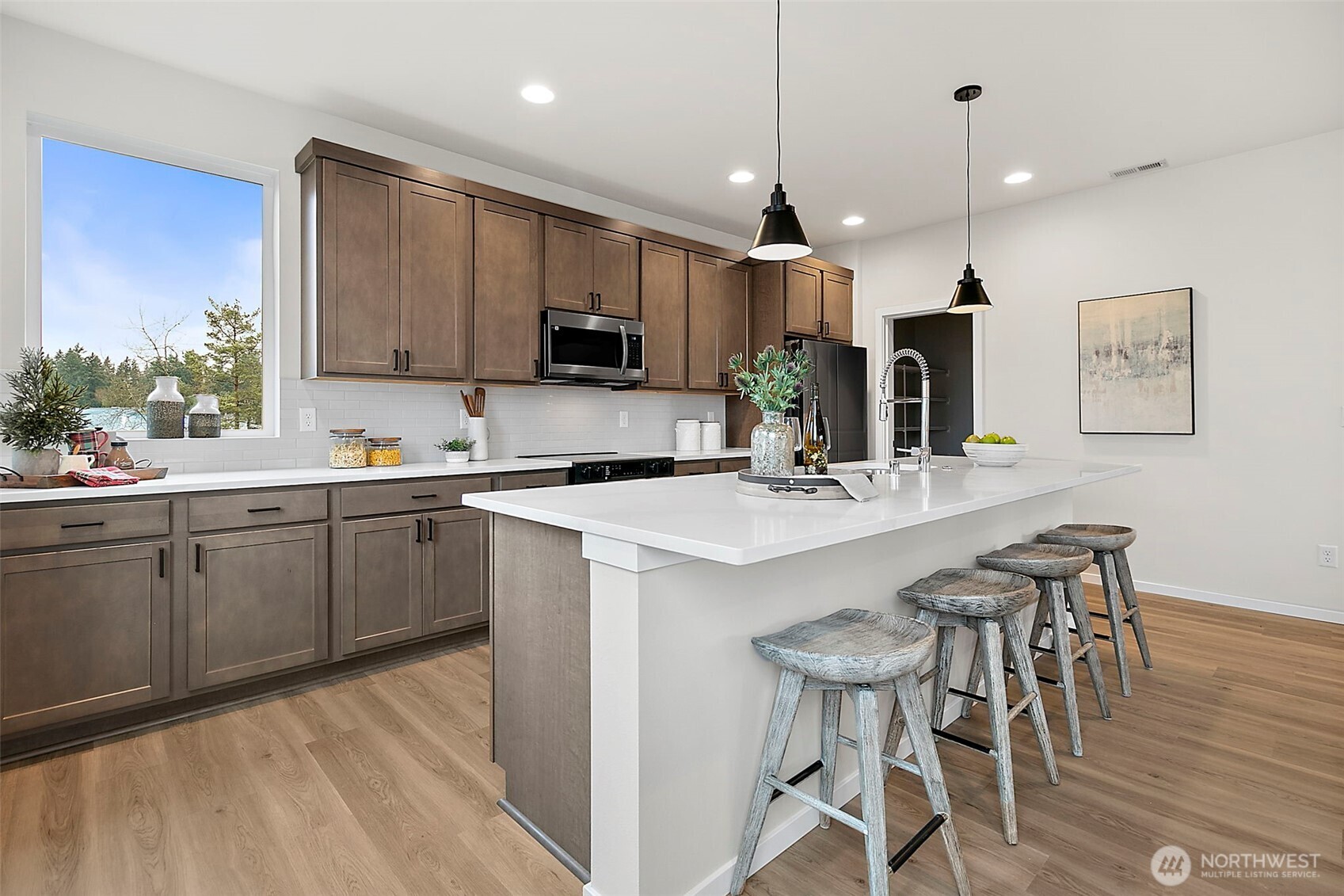 18510 Southeast 271st Place Covington, WA 98042 - Photo 11 of 23 a kitchen with a sink cabinets and window