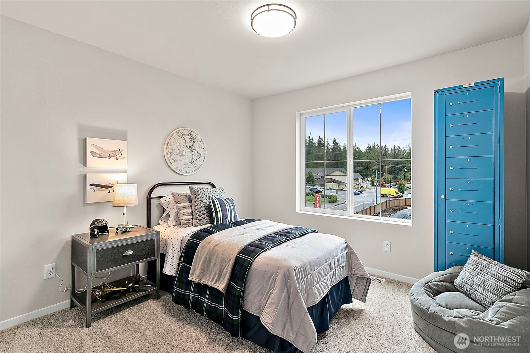 18510 Southeast 271st Place Covington, WA 98042 - Photo 20 of 23 a bed room with a bed and a chair