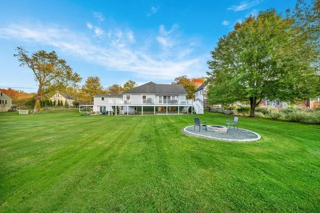 a view of a house with a big yard