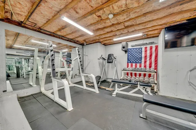 a view of a room with gym equipment