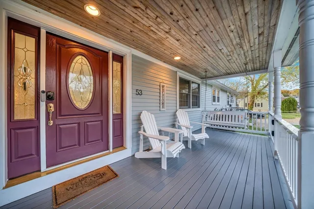 a view of a livingroom with furniture and wooden floor