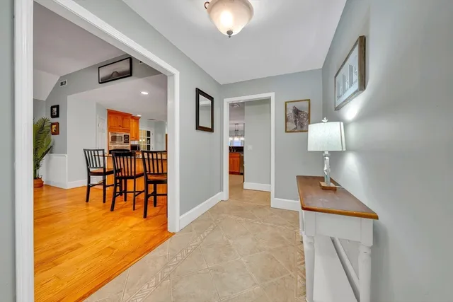 a view of livingroom and dining room with furniture