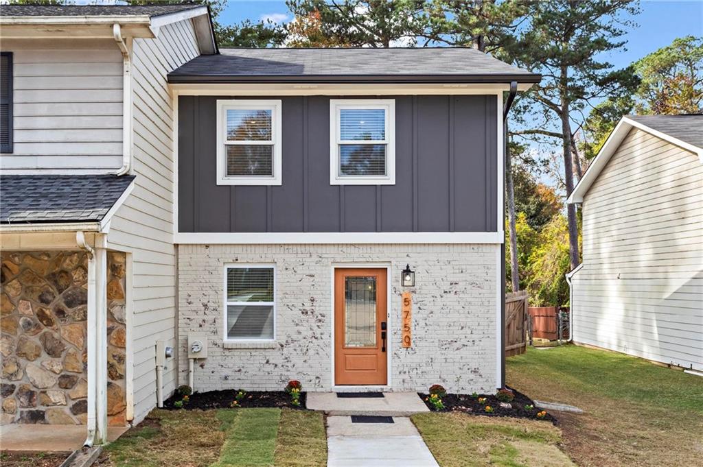5750 Old Gordon Road Mableton, GA 30126 - Photo 1 of 31 a front view of a house with brick walls