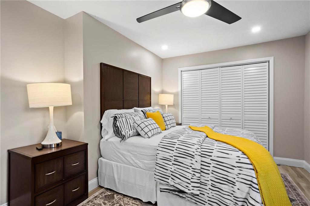 5750 Old Gordon Road Mableton, GA 30126 - Photo 22 of 31 a bedroom with a bed and a lamp