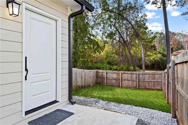 a view of a backyard with a garden