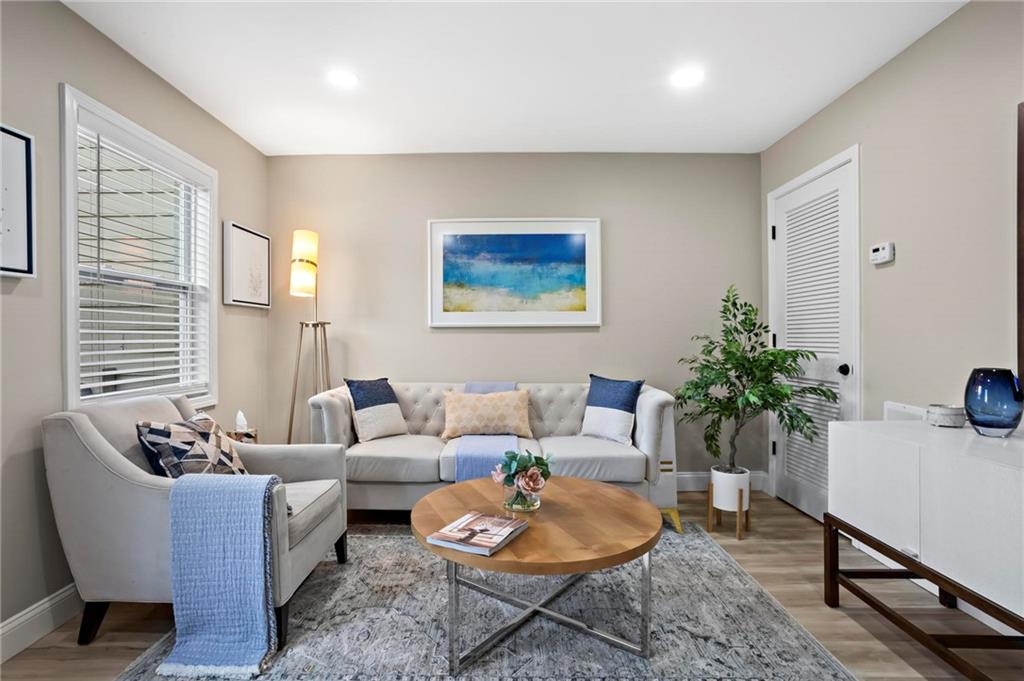 5750 Old Gordon Road Mableton, GA 30126 - Photo 6 of 31 a living room with furniture and a potted plant