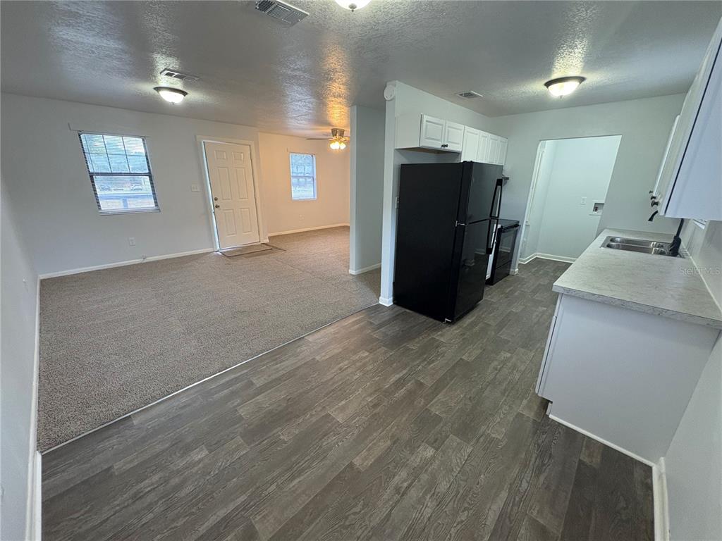 5206 Grimes Road Polk City, FL 33868 - Photo 2 of 17 a view of a storage & utility room