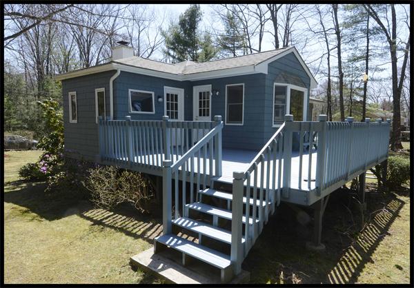 19 Long Meadow Road Chelmsford, MA 01824 - Photo 14 of 19 a view of a house with wooden deck front of house