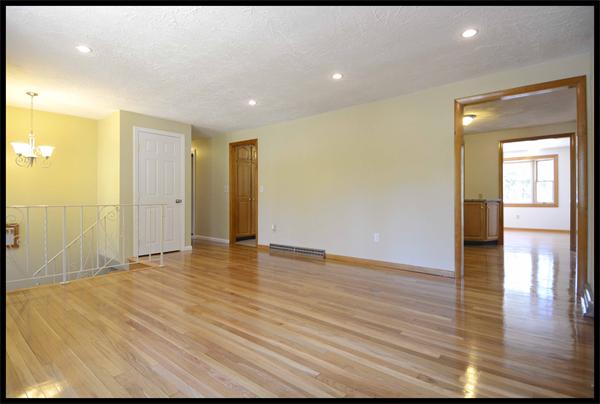 19 Long Meadow Road Chelmsford, MA 01824 - Photo 2 of 19 a view of empty room with wooden floor