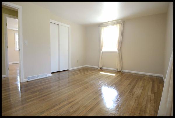 19 Long Meadow Road Chelmsford, MA 01824 - Photo 7 of 19 a view of empty room with wooden floor