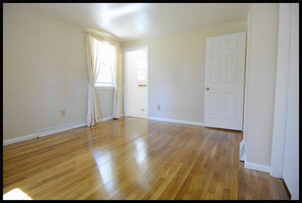 19 Long Meadow Road Chelmsford, MA 01824 - Photo 8 of 19 a view of empty room with wooden floor