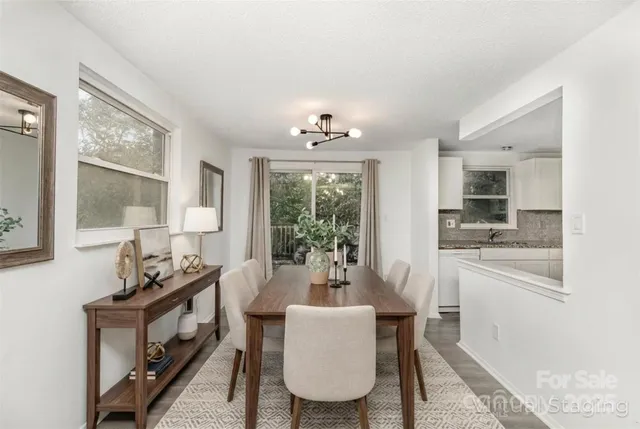 a dining room with furniture window wooden floor