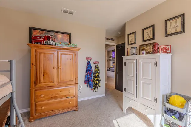 a view of a livingroom with furniture and workspace