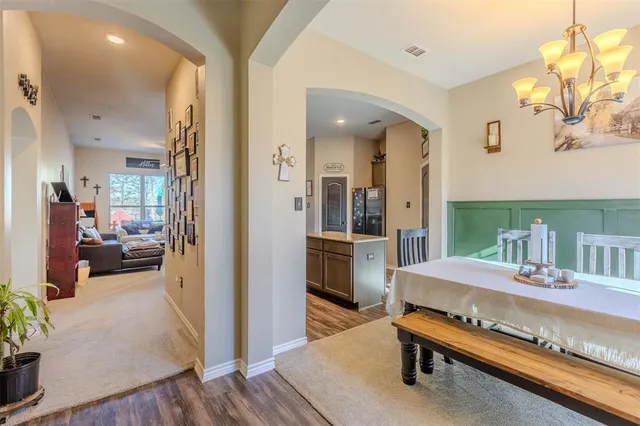 a bedroom with furniture and a table