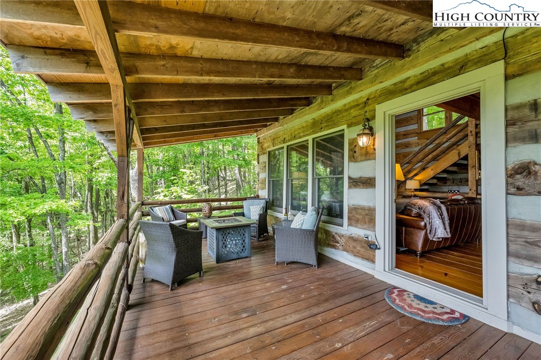 289 Summit Drive Todd, NC 28684 - Photo 16 of 42 a view of porch with seating space