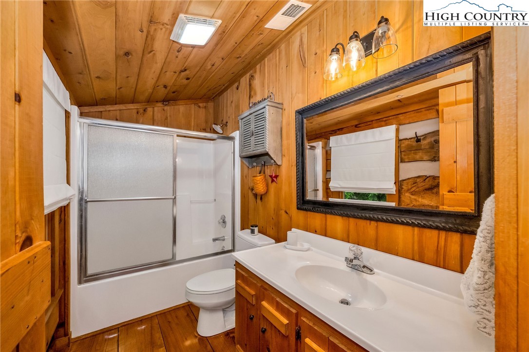 289 Summit Drive Todd, NC 28684 - Photo 32 of 42 a bathroom with a sink a toilet and shower