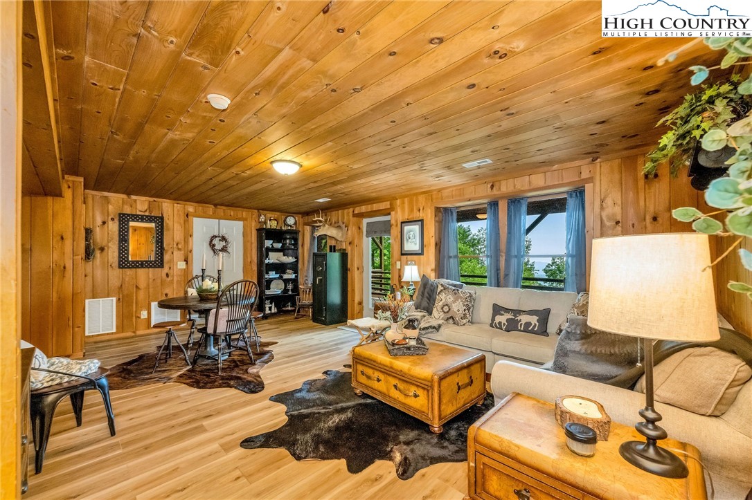 289 Summit Drive Todd, NC 28684 - Photo 36 of 42 a living room with furniture and a large window