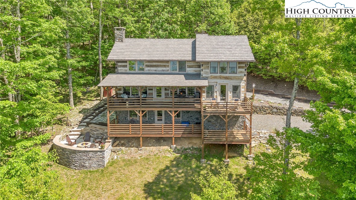 289 Summit Drive Todd, NC 28684 - Photo 41 of 42 an aerial view of a house with a garden and swimming pool