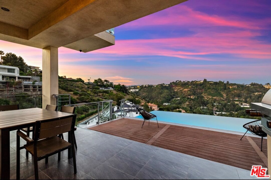 1018 Stradella Road Los Angeles, CA 90077 - Photo 2 of 22 a view of a terrace with sky view