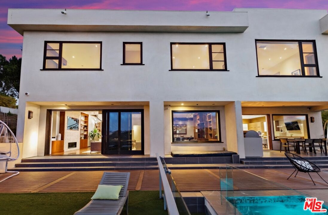 1018 Stradella Road Los Angeles, CA 90077 - Photo 9 of 22 a view of building with door