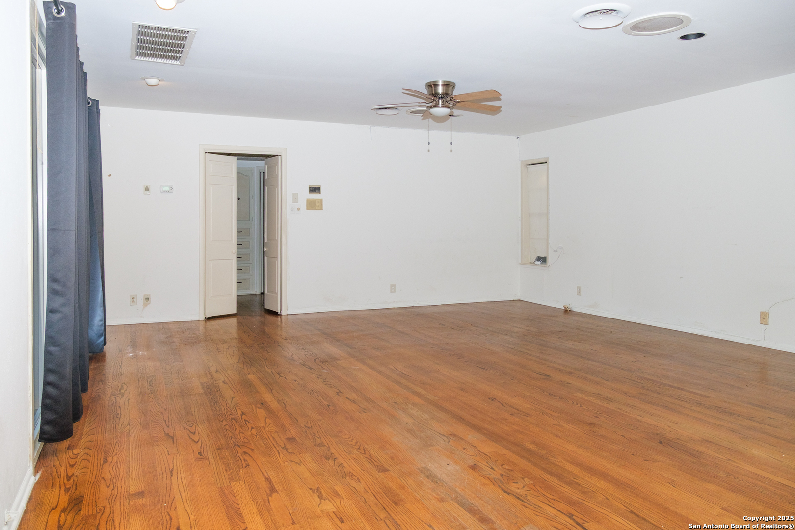 109 Dover Road San Antonio, TX 78209 - Photo 11 of 25 a view of empty room with wooden floor