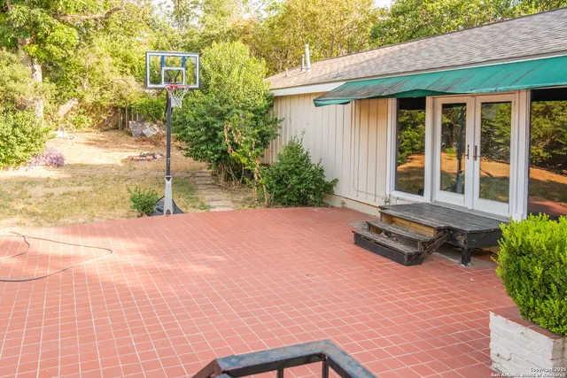 a backyard of a house with seating space