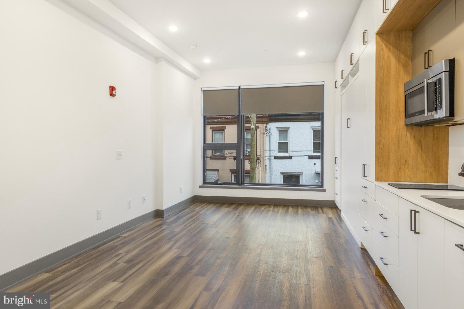 1935 East Hazzard Street, Unit 201 Philadelphia, PA 19125 - Photo 4 of 20 a view of hallway with wooden floor