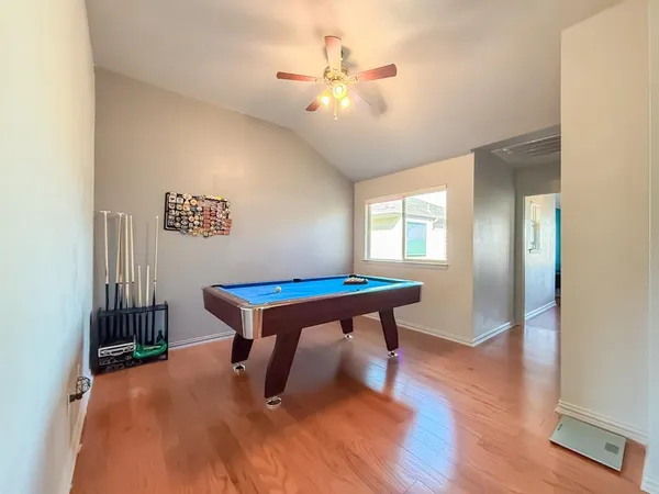 a room with furniture window and wooden floor